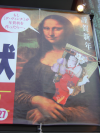 Mona Lisa speaking Japanese and holding a Japanese fan
