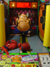 Round belly villain awaiting a player to don the boxing gloves
