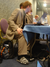 EricP's touch of class: a suit and tiger furry slippers