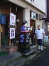 Front of a restaurant and the cook