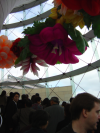 Inflated flowers dangling from the ceiling in the stairway to the Mori Art Museum
