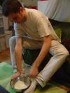 Olivier working with both feet and both hands 