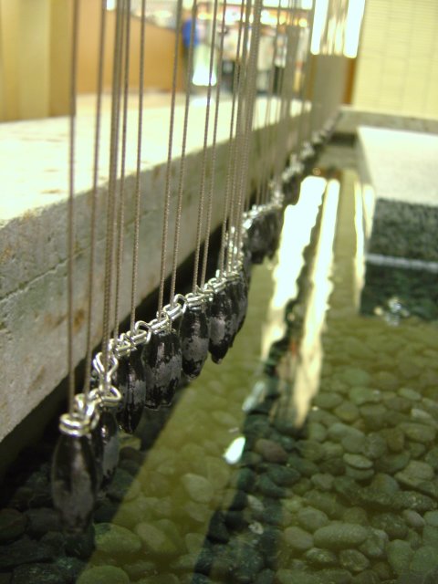 Beads above water