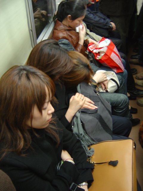 Girls sleeping in the train