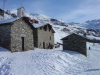 Maisons de pierres sous la neige