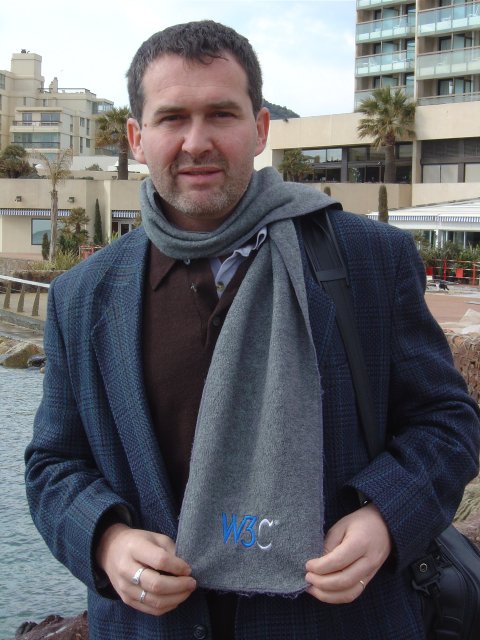 Daniel holding the w3c embroidering of his scarf