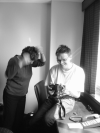 Marie-Claire brushing her hair with her finger, Maxf laughing beside her