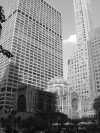 St Bart church nested amond tall buildings