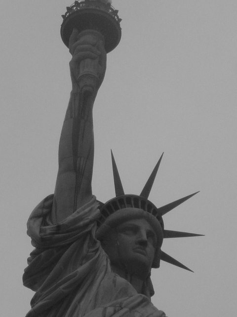Close up of the statue of Liberty holding the flame