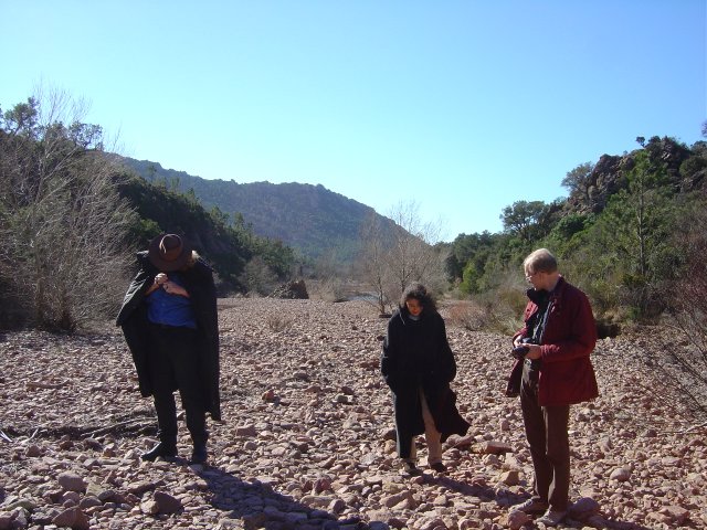 Chaals attending to his pipe, Karima attending to looking at her feet and Bert attending to seeing if they will move on soon or what