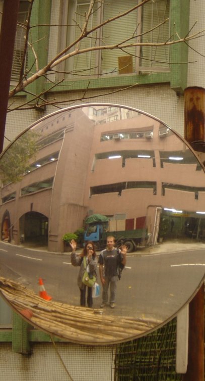 Nico and I waving at our reflection in a mirror