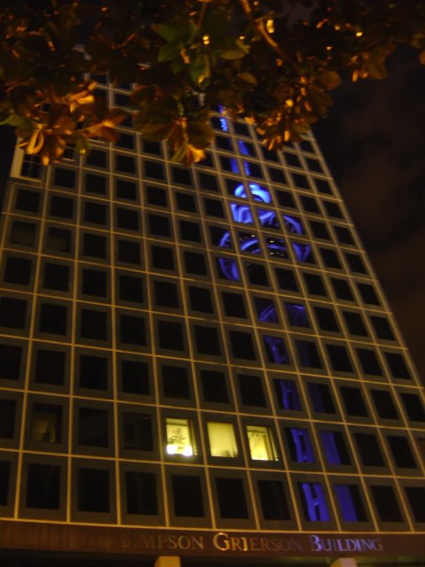 Auckland tower reflected in a building