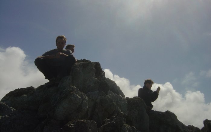 Perched on top of rocks: Nico, Fabrice, Joel