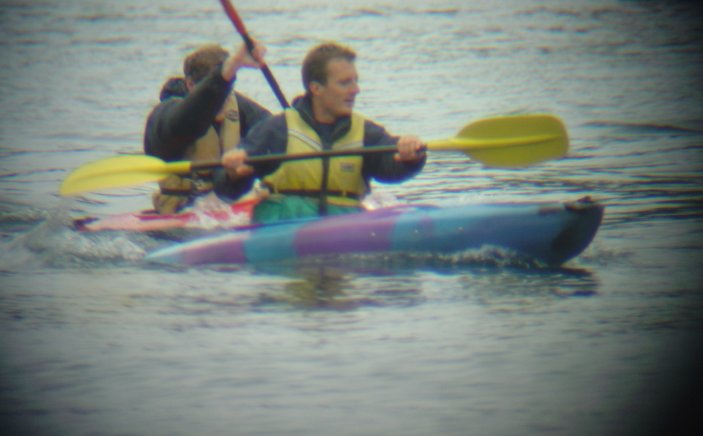 Joel and Fabrice in a canoe