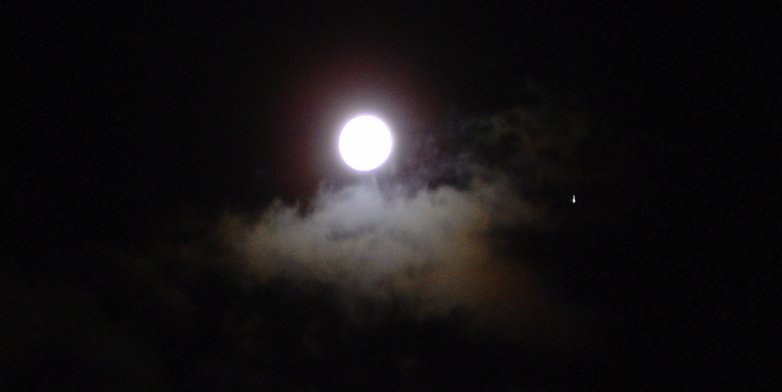 Full Moon in Virgo (Spica is the bright star at the right of the cloud, I think)