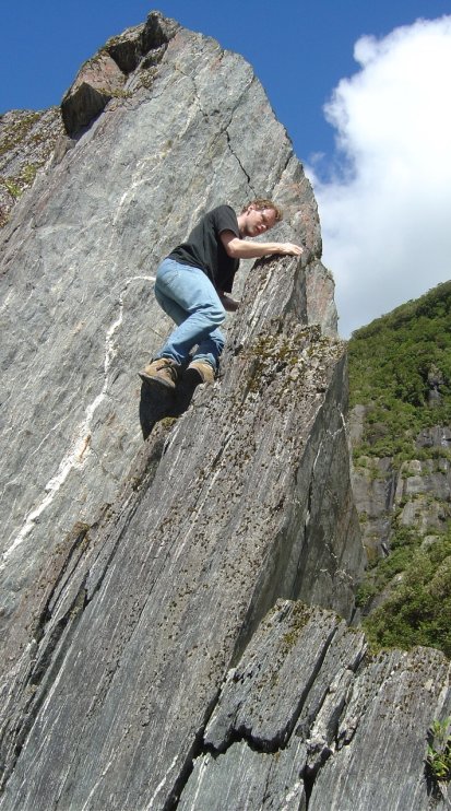 Joel rock climbing
