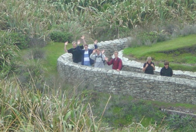 Nico, Joel, Nicolas, Fabrice waving, Pancake rocks at Punakaiki
