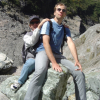 Both Nicolas riding a rock