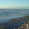 Tasman Sea and rocks on a beach