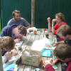 The Frenchies writing postcards at our backpacker of Punakaiki while the Dutch are having breakfast
