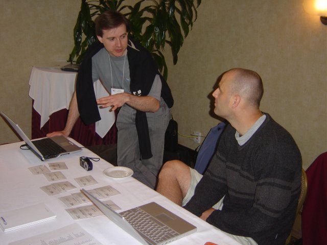 Yves Lafon and Dean Jackson pretending to have a serious conversation, Hyatt Harborside, Boston