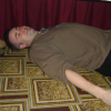 Danbri under the table, pretending to sleep, Hyatt Harborside