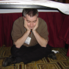 Danbri under the table, pretending to sleep, Hyatt Harborside