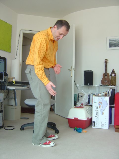 Hugo trying to convince me that red shoes and orange shirt is visionary fashion