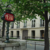Metro sign, Gucci shop, trees