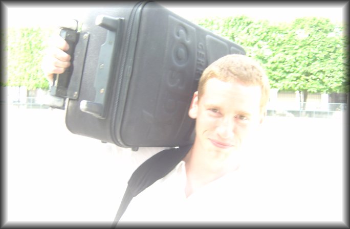 overexposure: ericP holding his suitcase on a shoulder