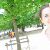 overexposure: woman in red, man in yellow, green trees, coralie in white