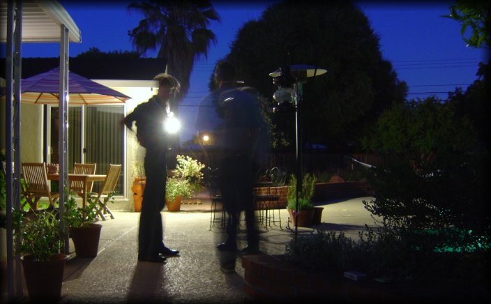Ian, Jeff and Arnaud at dusk. Santa Clara, CA. Long exposure makes for bodies to appear like shadows.