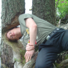 ericP sticking his head where the beavers ate the tree away