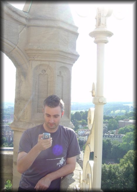 Danbri up Cabot Tower and fiddling with his pda-camera-phone