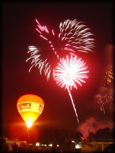 Glowing balloon and fireworks