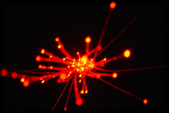 Red dots and lines on black