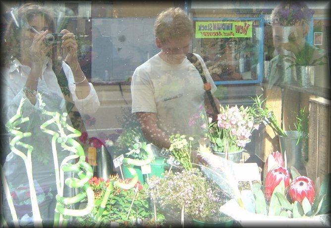koalie, ericP and danbri at a florist's window