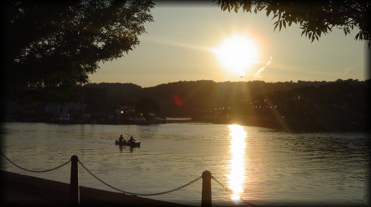 Canoe on river Avon. The sun about to set. 