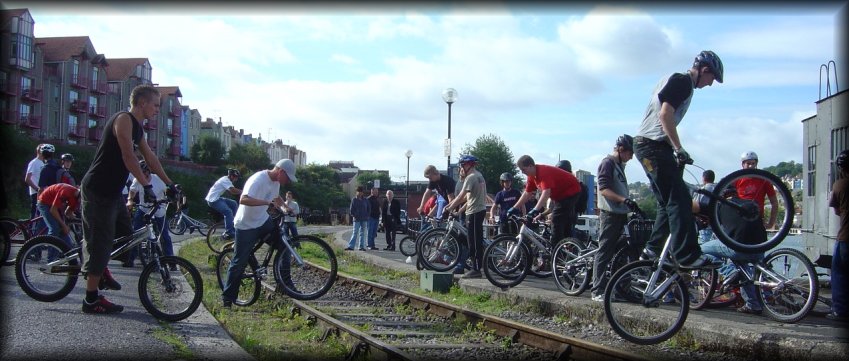 Bikers on the railtracks by the harbour