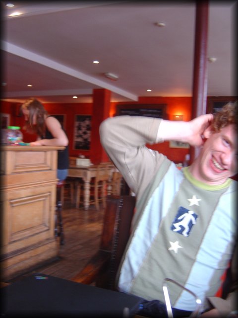 EricP goofing around, waitress in the background