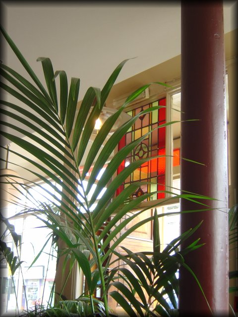 Stained glass above the entrance of Tinto's Lounge
