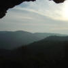window in the ruins and view on the mountains from Mont Peygros near Auribeau sur Siagne, FR