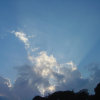 the sun just disappeared behind the hill in front of my apartment, and casts beams