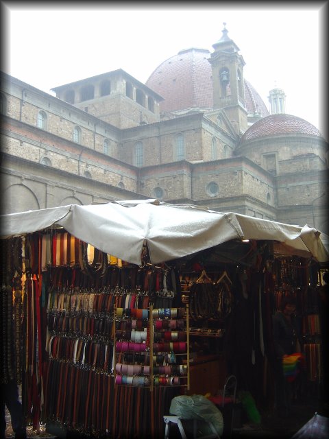 Market behind il Duomo, Firenze, warm colours under the tent and grey from the weather above