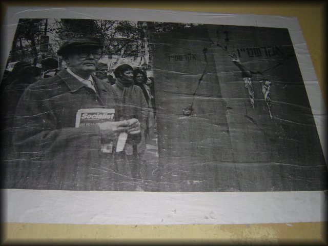 Black and white poster on the wall of a street, Firenze