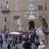 Crowd and merchant in front of il Palazzo Vecchio, Firenze