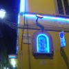 Via dell'Amorino and neon lit nativity scene on the wall, Firenze