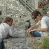 Mason, Robin petting a cat, Monterosso al Mare, one of the cinque terre