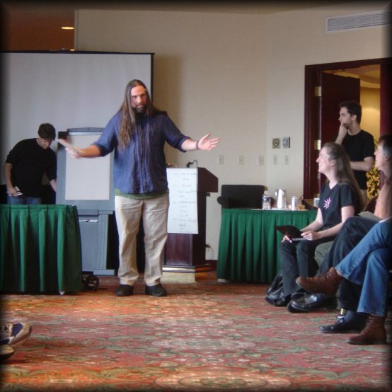 Sandro looks like the messiah preaching but I'm not positive this was his performance (Vegas gambler, maybe?) at Team Day