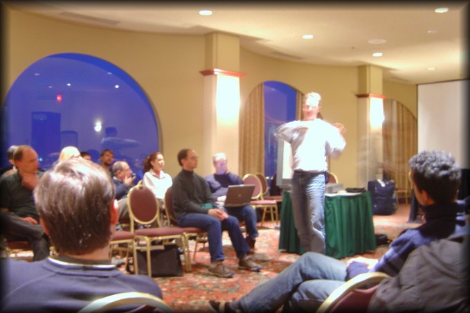DanC (and his reflection in the window) seems to be playing an invisible fiddle, Team Day